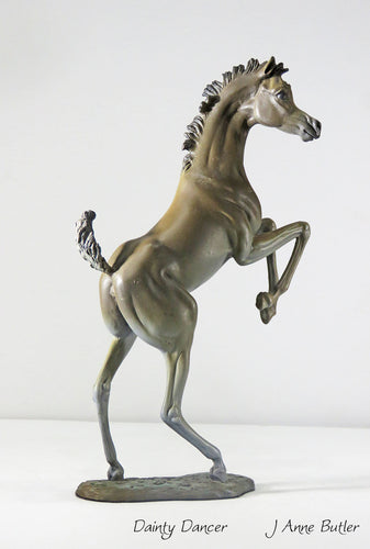Bronze foal statue in classical bronze patina.
