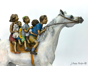 Escultura "Todos a bordo" de J. Anne Butler.