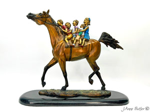 "All Aboard" sculpture in bay patina by J. Anne Butler.