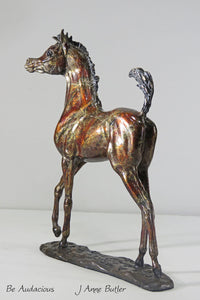 Bronze foal sculpture in contemporary red bronze patina