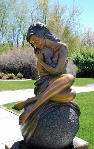 Solitaire life size figurative bronze sculpture by J. Anne Butler 