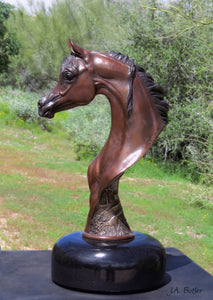 A wonderful bronze equine statue in a bay patina. 